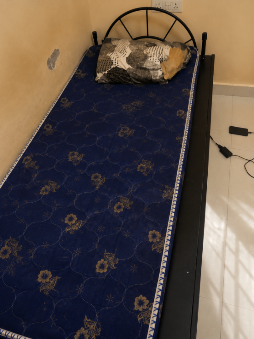 Sturdy single cot bed with mattress for sale. - Image 1