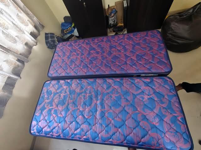 Selling 2 single wooden beds with mattresses + 1 Sattva XXXL bean bag as a combo deal. - Image 1