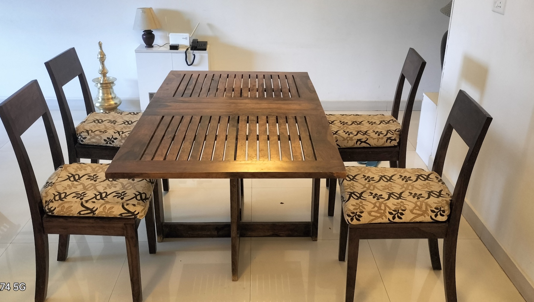 Sparingly used  Foldabale Dining table and 4 upholstered dining chairs  for sale - Image 1