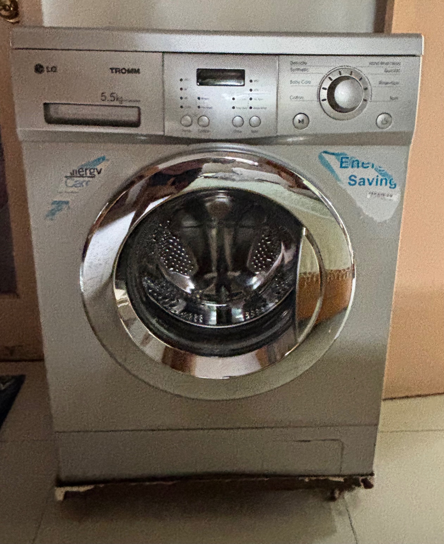 LG front loading washing machine with stand- rarely uses - Image 1