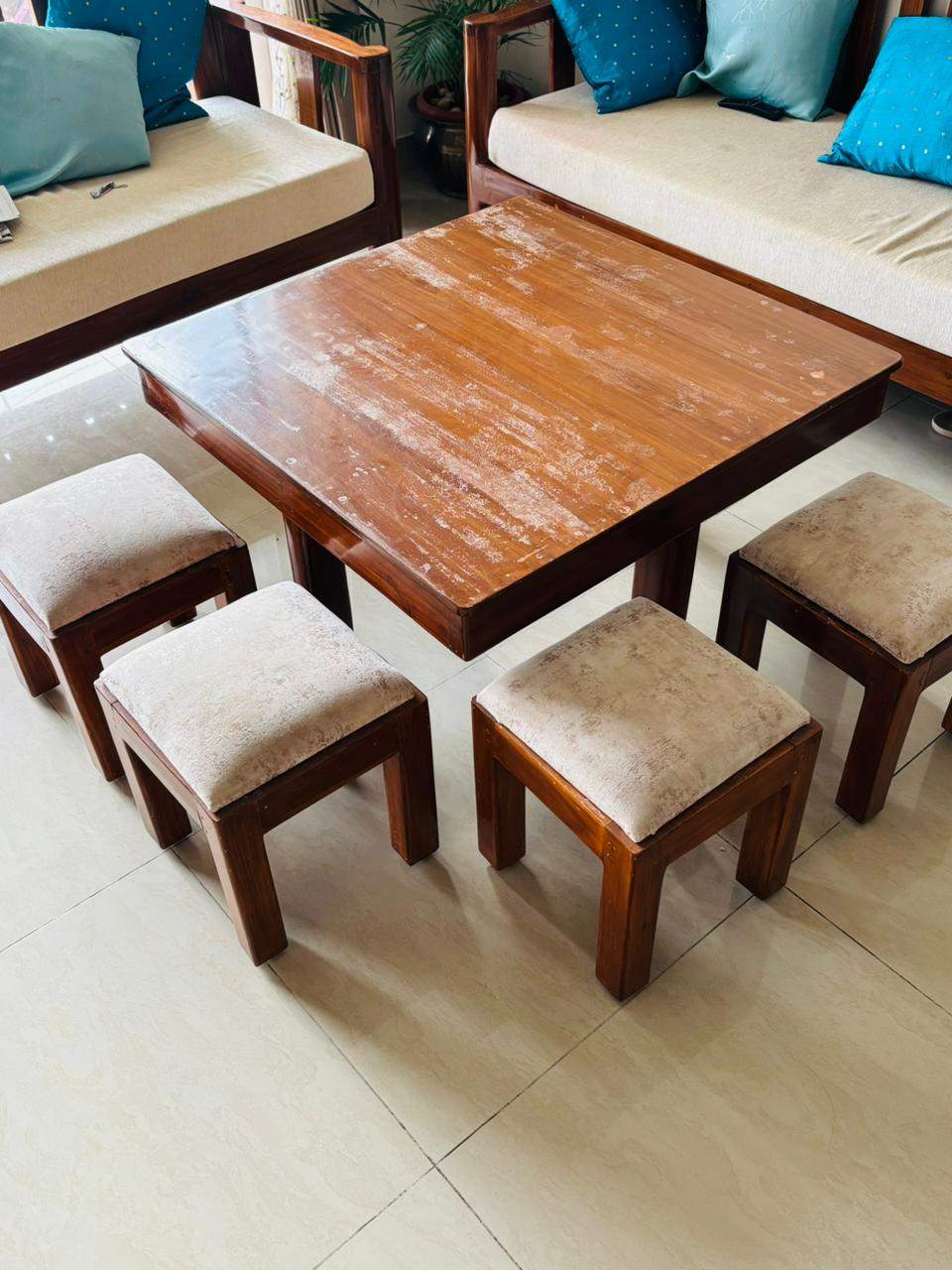 Coffee table with 4 seating stools - Image 1