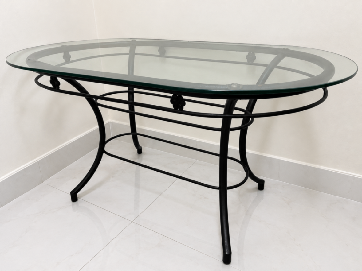 6 seater Oval Glass dinning table with 4 matching chanirs - Image 6